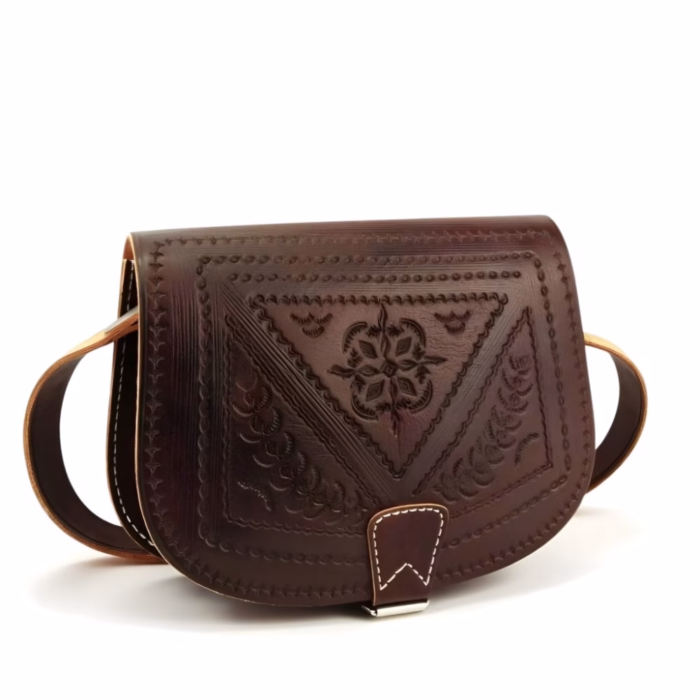 Detailed front view of embossed leather shoulder bag