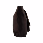 Leather tote bag on modern table with plants