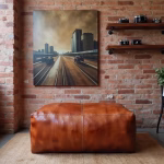 Moroccan leather rectangle ottoman pouf against exposed brick wall