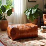 Leather rectangle ottoman 36 cognac brown pouf in bright living room with houseplants and natural light