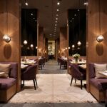 White Moroccan rug with diamond motif in fine dining restaurant interior with pendant lighting