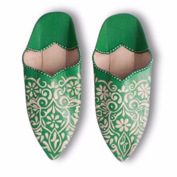 Green leather babouche slippers with traditional engravings