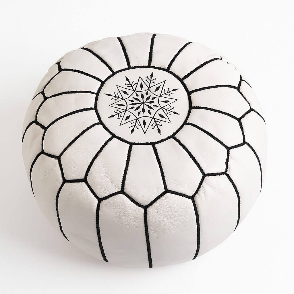 Handcrafted Multicolor Stitching Leather Pouf in Genuine White Leather White leather floor ottoman with geometric black stitching and star embroidery centerpiece on neutral background