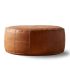 Large Moroccan pouf in light brown leather, studio view