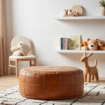 Leather floor ottoman pouf in children's playroom with toys and natural light wooden flooring