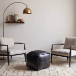 Moroccan leather ottoman with arc floor lamp