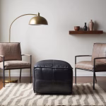 Moroccan leather ottoman with arc floor lamp