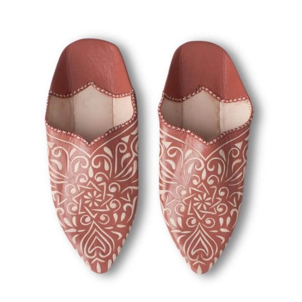 Terracotta leather babouche slippers with detailed engravings