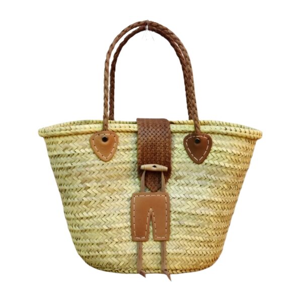 "Crafted from handwoven palm leaf with braided leather handles and a wooden toggle closure — this Moroccan market basket goes from souk to shore." - 128 chars ✓