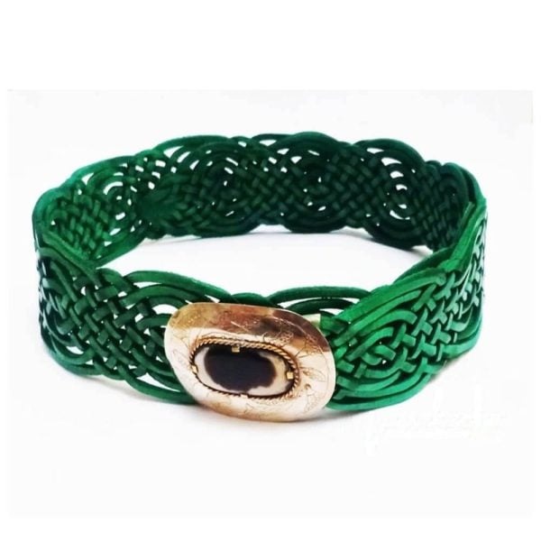 Green braided leather belts for women with intricate Celtic knot design and gold medallion buckle with black stone