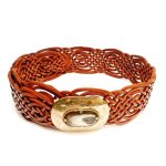 Brown woven leather belts for women featuring handmade basketweave pattern and decorative gold oval buckle clasp