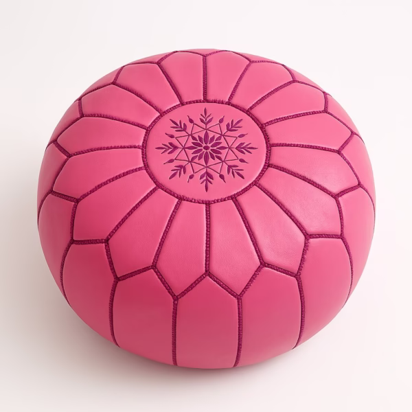 Handcrafted Moroccan pink pouf with starburst stitching pattern, top view