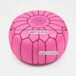 Size diagram for the pink leather round ottoman, indicating measurements of 21 inches in diameter and 12 inches in height.