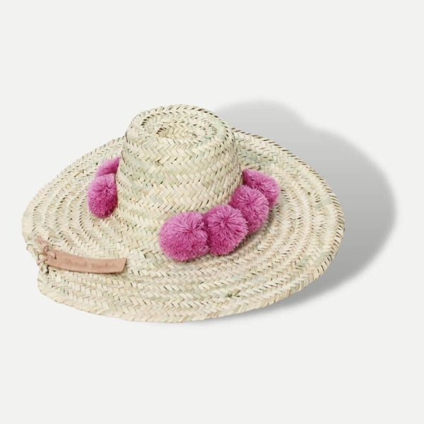 Flat lay of straw beach hat showing natural texture