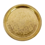 Detailed view of serving tray's engraved surface pattern