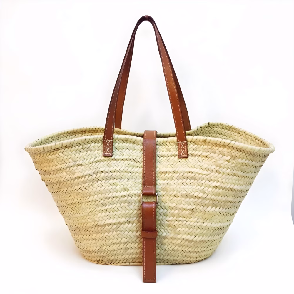 Natural straw shoulder bag with brown leather handles and belt detail