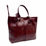 Product photo of ladies leather tote bag against white background