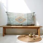 moroccan silk cactus pillow cover styled with brass decor