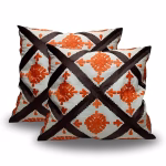 Product photo of vibrant Berber cushion cover set in orange and brown