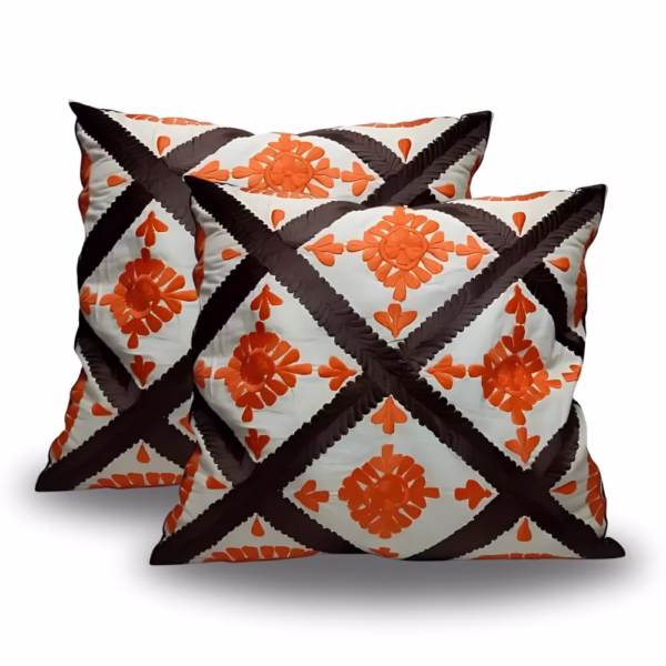 Product photo of vibrant Berber cushion cover set in orange and brown