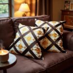 Woven diamond cushion covers displayed on brown leather sofa with dimensional golden floral embellishments