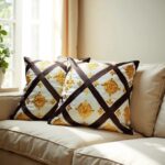 Woven diamond cushion covers on beige couch with textured golden embroidery and brown geometric lattice