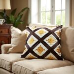 Woven diamond cushion covers with cotton-silk fabric, golden medallions and dark brown crisscross pattern