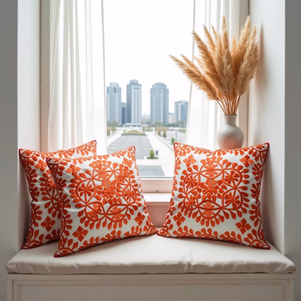 Set of embroidered cushions in modern living space