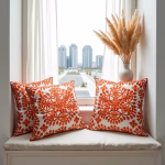 Set of embroidered cushions in modern living space