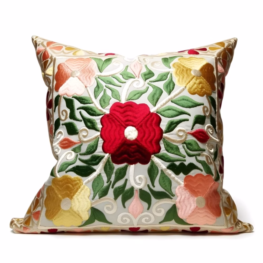 Single Moroccan pillow case showing detailed floral embroidery pattern in red and gold
