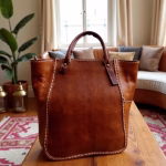 Detail shot of leather tote showing craftsmanship and zipper