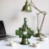 Green ceramic cross candleholder with desk lamp