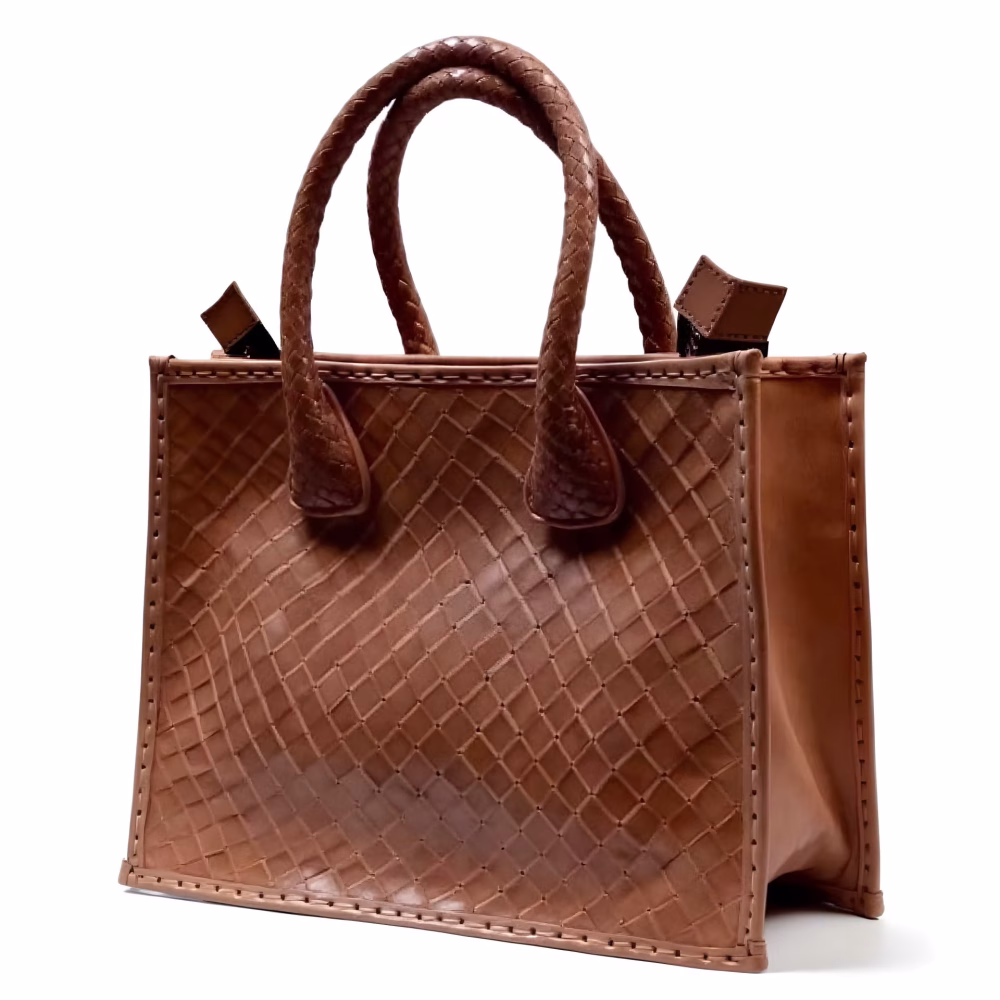 Front view of brown woven leather handbag