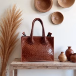 Handwoven leather bag with bohemian decor