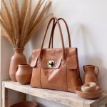 Light brown leather bag with dried pampas grass decor