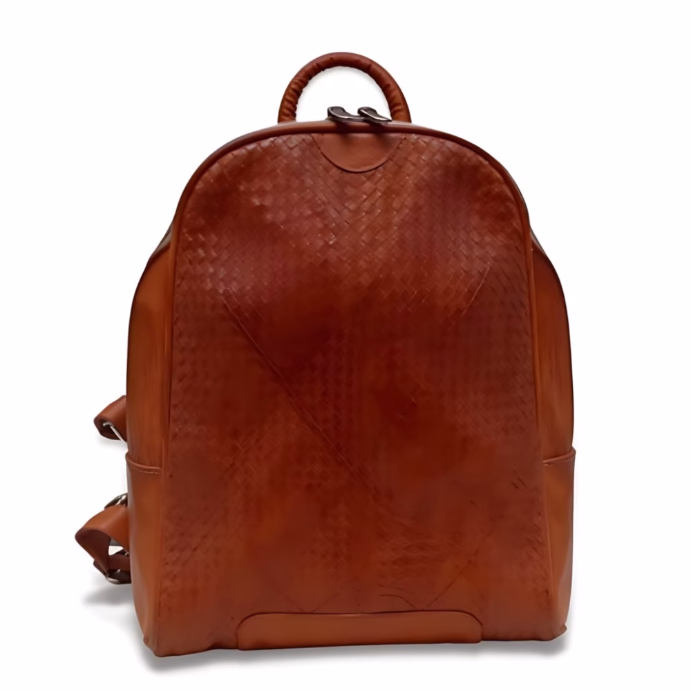Product shot of woven leather backpack