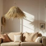 Natural handwoven palm leaf pendant light casting textured shadows in minimalist beige living room