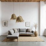 Pair of handwoven palm leaf pendant lights with cascading natural fibers in modern Scandinavian lounge