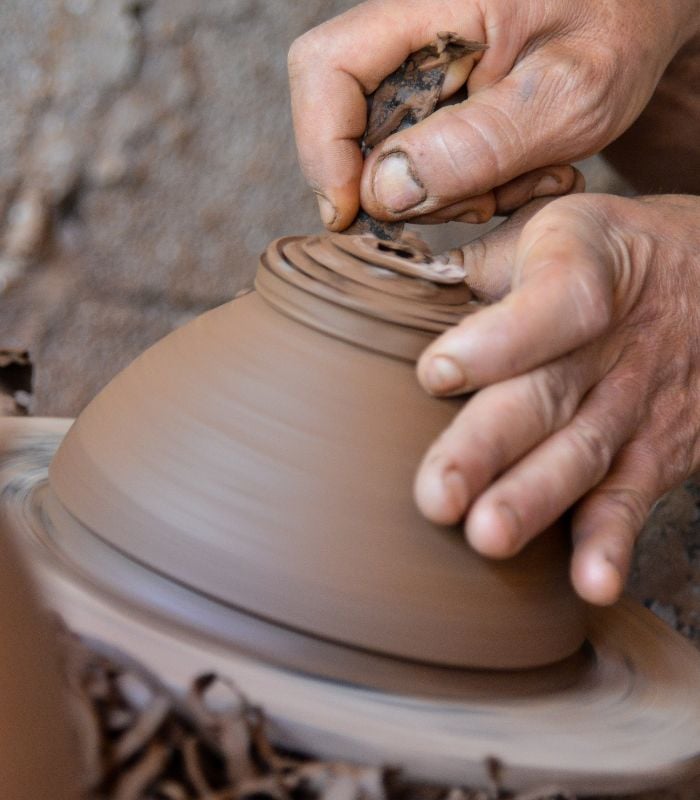 About Marrakeche Crafts: Preserving Moroccan Art and Empowering Local Artisans Pottery artisan woman, about us section