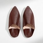 Brown handcrafted Moroccan leather slippers showing natural tan interior, traditional pointed toe babouche style