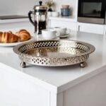Moroccan silver circle tray with ornate pierced ajouré rim detail close-up