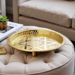 Round brass serving tray with central hand-engraved Star of David and concentric geometric rings