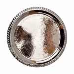 Detailed view of hammered silver serving tray with rope edge