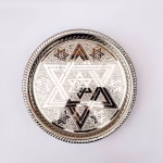 Hand-engraved round platter trays with a Star of David pattern, handmade in Morocco.