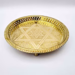 Hand-engraved round platter trays with a Star of David pattern, handmade in Morocco.