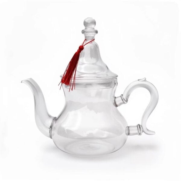 Handblown borosilicate glass teapot with tassel and crimson silk knot featuring a clear gooseneck spout
