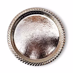 Overhead view of hand hammered silver circle tray showing detailed texture and rope edge design