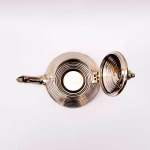 Detail of silver-plated teapot lid mechanism