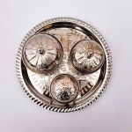 Top view of arranged sugar bowl containers on decorative serving tray