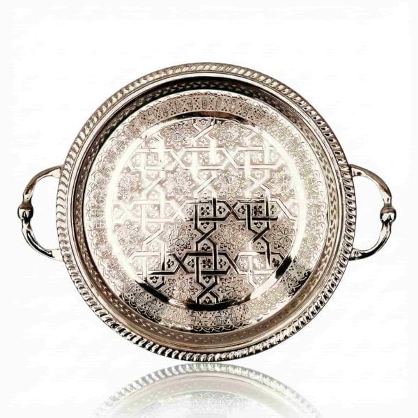 Top view of silver-plated brass serving tray showing geometric star pattern and handles